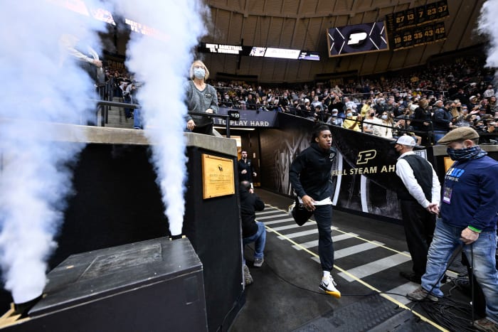 Jaden Ivey runs through the Purdue tunnel before the Nicholls State game.